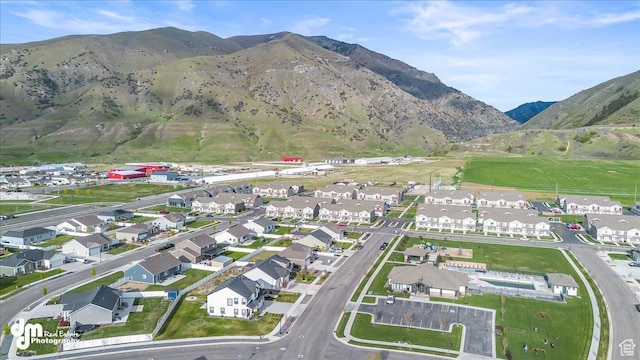 bird's eye view featuring a residential view and a mountain view