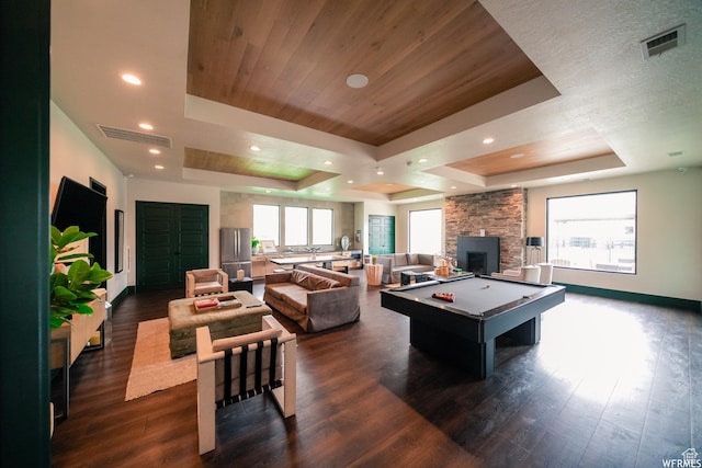 playroom with a tray ceiling, visible vents, billiards, and dark wood finished floors