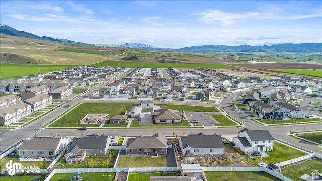 bird's eye view with a mountain view and a residential view