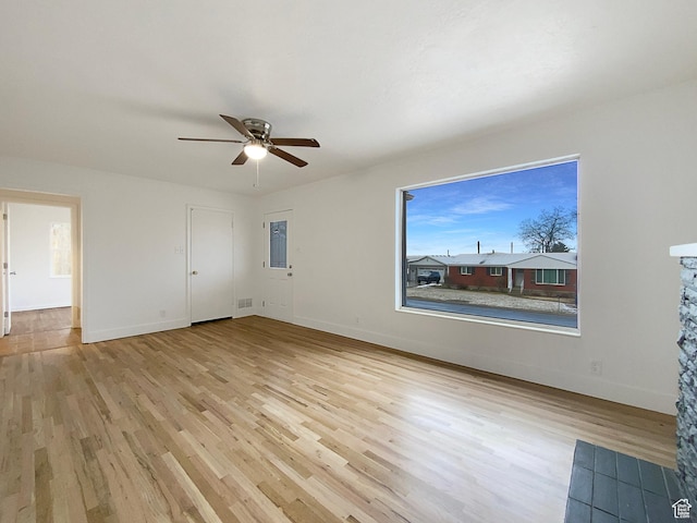 2943 S 400 W, Bountiful, UT 84010 - unfurnished room featuring light wood-style flooring, visible vents, baseboards, and a ceiling fan