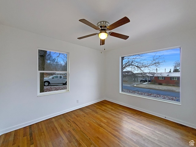 2943 S 400 W, Bountiful, UT 84010 - empty room with ceiling fan, baseboards, and wood finished floors