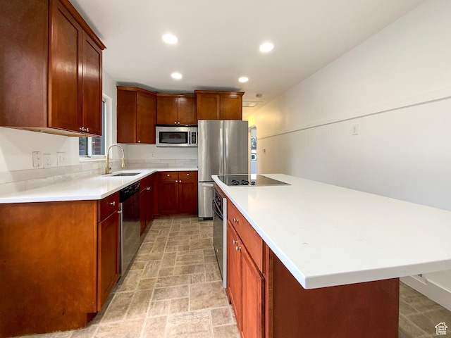 2943 S 400 W, Bountiful, UT 84010 - kitchen with a sink, stainless steel appliances, a kitchen island, and light countertops