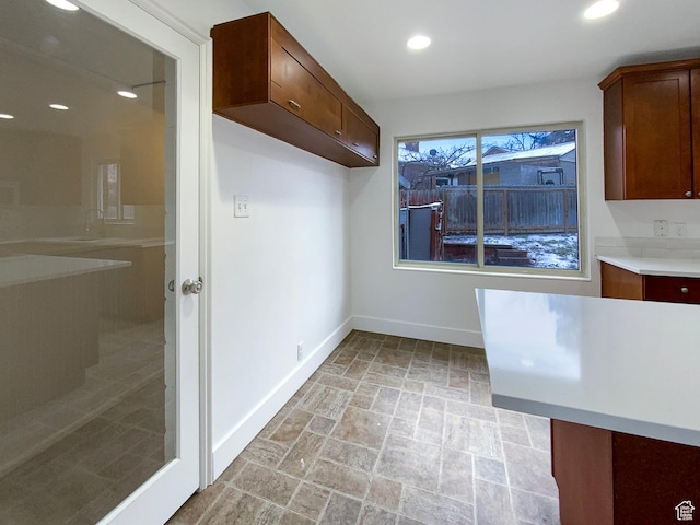 2943 S 400 W, Bountiful, UT 84010 - kitchen featuring light countertops, stone finish floor, recessed lighting, and baseboards