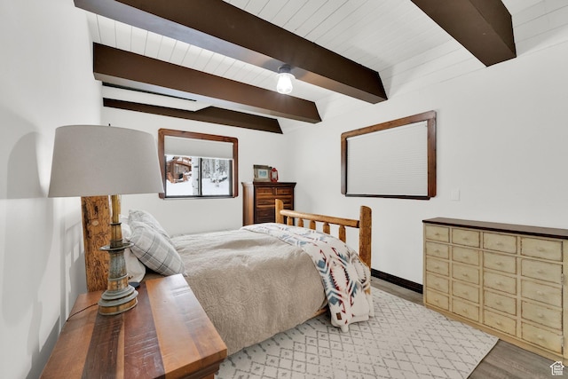 11249 E Columbine Ln Unit 1607, Heber City, UT 84032 - bedroom with beam ceiling, light wood finished floors, and baseboards