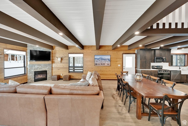 11249 E Columbine Ln Unit 1607, Heber City, UT 84032 - living room featuring beam ceiling, wood walls, light wood-style flooring, recessed lighting, and a fireplace