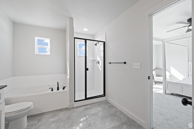 full bathroom with a garden tub, a stall shower, ceiling fan, a textured ceiling, and baseboards