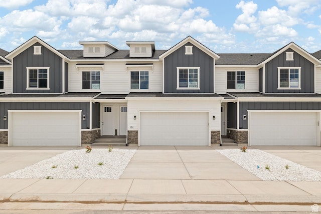 101 W 1360 N, Nephi, UT 84648 - view of front facade with stone siding, an attached garage, and board and batten siding
