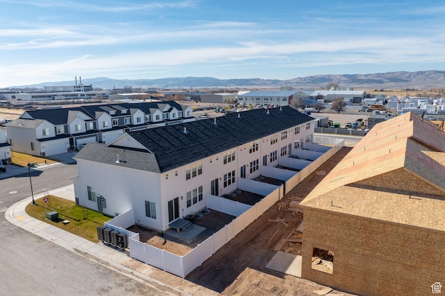 drone / aerial view featuring a mountain view