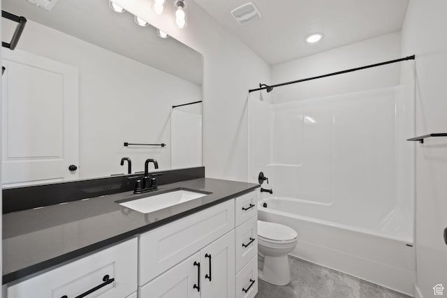 full bath featuring toilet, visible vents, shower / washtub combination, and vanity