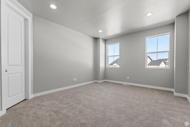 2571 N 3200 W, Clinton, UT 84015 - empty room featuring carpet, baseboards, and recessed lighting