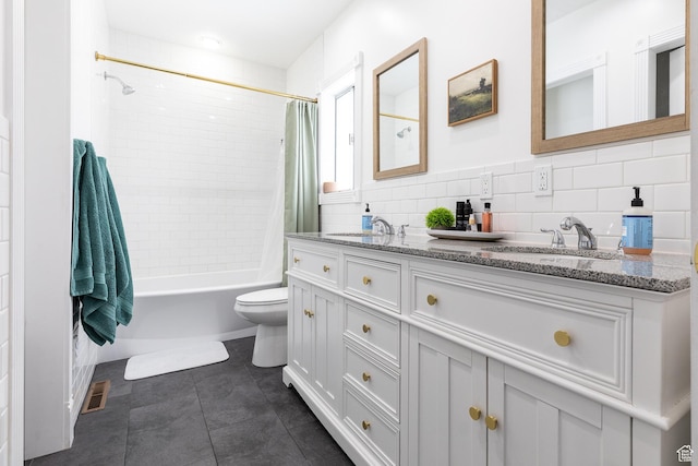93 N 200 W, Smithfield, UT 84335 - full bath featuring a sink, visible vents, tile walls, double vanity, and shower / bath combo with shower curtain