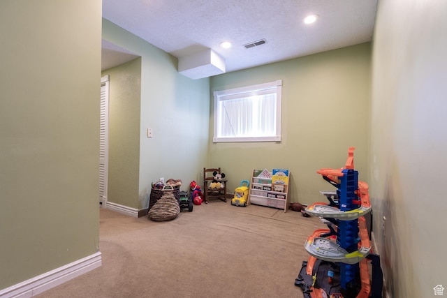 93 N 200 W, Smithfield, UT 84335 - recreation room featuring a textured ceiling, recessed lighting, light colored carpet, visible vents, and baseboards