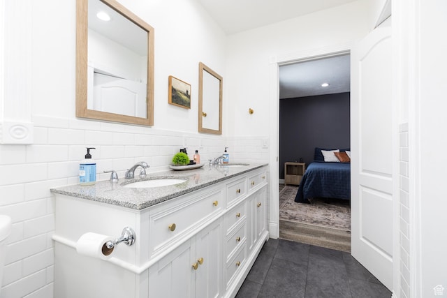 93 N 200 W, Smithfield, UT 84335 - ensuite bathroom with a sink, ensuite bath, and tile walls