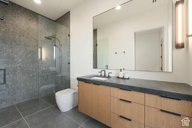 2655 W Shoshoni Trl, St George, UT 84770 - bathroom with toilet, a stall shower, vanity, and tile patterned floors