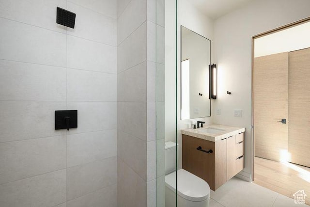 2655 W Shoshoni Trl, St George, UT 84770 - full bathroom with a shower, tile patterned flooring, vanity, and toilet