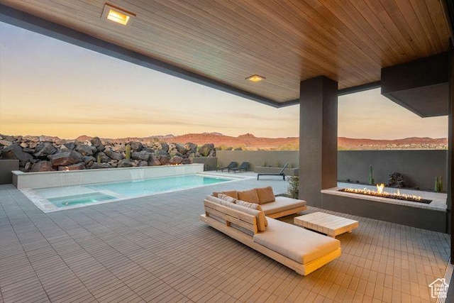 2655 W Shoshoni Trl, St George, UT 84770 - outdoor pool with a patio and a fire pit
