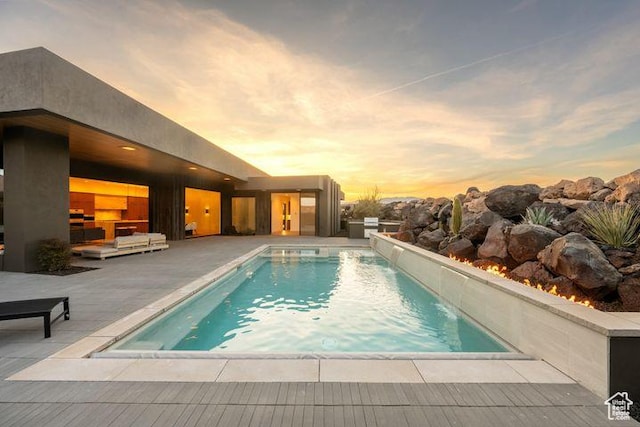 2655 W Shoshoni Trl, St George, UT 84770 - pool at dusk with an outdoor pool and a patio
