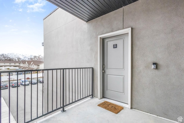 875 S Depot St Unit C316, Clearfield, UT 84015 - entrance to property featuring a balcony and stucco siding
