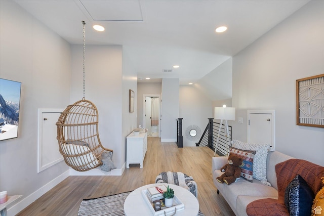 2321 E John Holladay Ct S, Holladay, UT 84117 - living room with lofted ceiling, recessed lighting, visible vents, and light wood-style floors