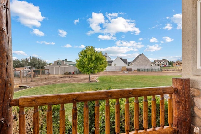 view of yard with fence and a residential view