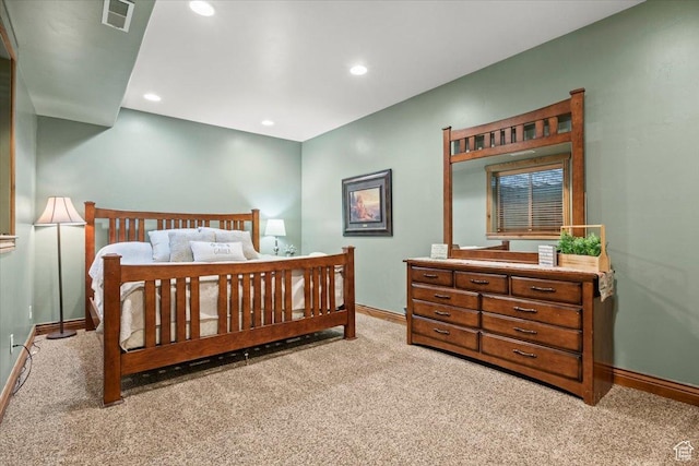 bedroom featuring light carpet, baseboards, visible vents, and recessed lighting