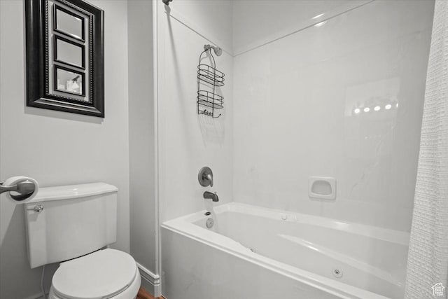 full bathroom with toilet and shower / tub combo