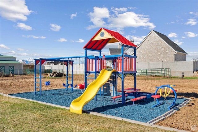 community jungle gym with fence