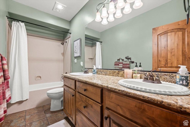 full bathroom with shower / tub combo with curtain, double vanity, a sink, and toilet