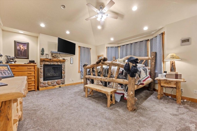 bedroom with baseboards, a fireplace, recessed lighting, light colored carpet, and lofted ceiling