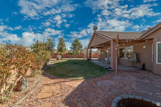1779 N 2330th Cir W, St George, UT 84770 - view of yard featuring a fenced backyard and a patio