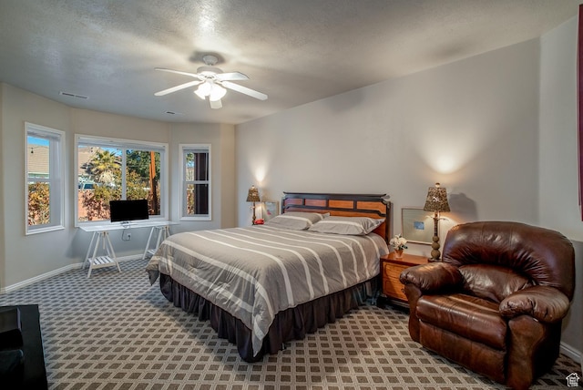 1779 N 2330th Cir W, St George, UT 84770 - bedroom with light carpet, visible vents, baseboards, a ceiling fan, and a textured ceiling