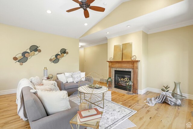 1429 E Chateau Ridge Way S, Sandy, UT 84092 - living room featuring lofted ceiling, a premium fireplace, baseboards, and wood finished floors