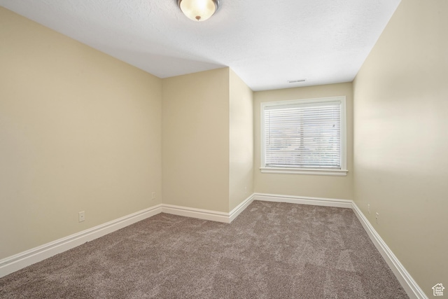 1429 E Chateau Ridge Way S, Sandy, UT 84092 - carpeted spare room featuring visible vents, a textured ceiling, and baseboards