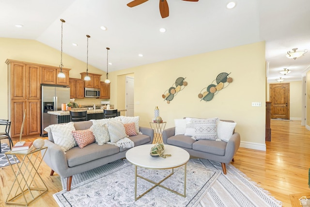 1429 E Chateau Ridge Way S, Sandy, UT 84092 - living room featuring lofted ceiling, ceiling fan, light wood-style flooring, recessed lighting, and baseboards