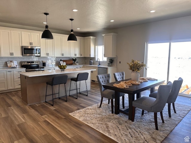 798 W Clark St N, Grantsville, UT 84029 - dining area featuring dark wood finished floors and recessed lighting