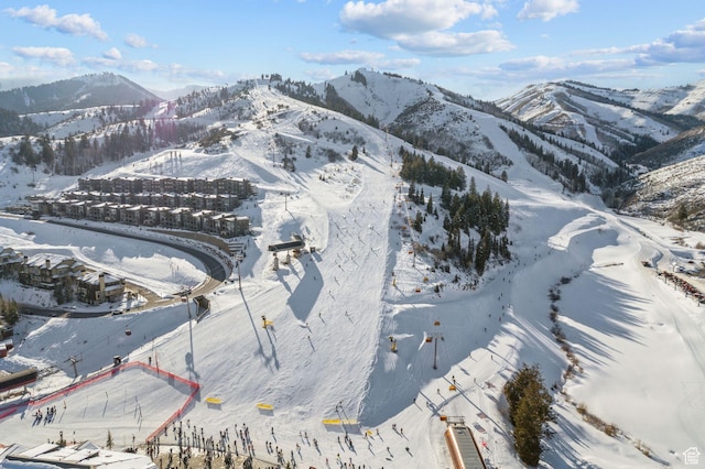 3720 N Sundial Ct Unit C207, Park City, UT 84098 - snowy aerial view with a mountain view and property parcel outlined