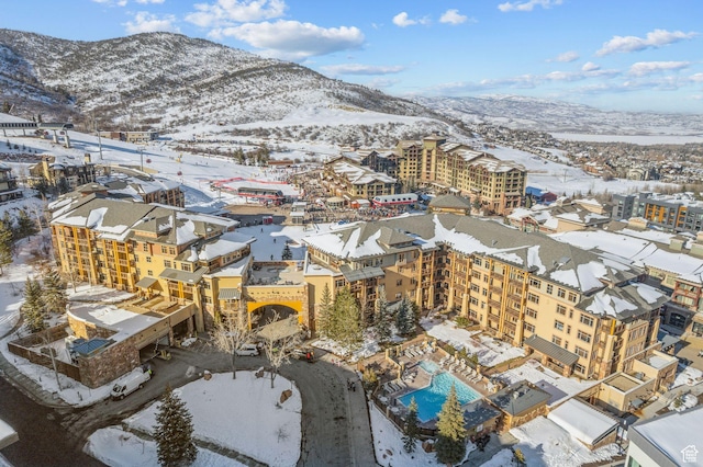 3720 N Sundial Ct Unit C207, Park City, UT 84098 - snowy aerial view featuring a mountain view and view of pool