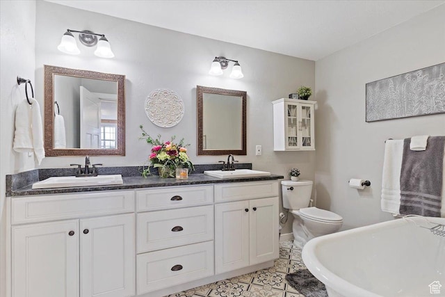 4337 N 2900 E, Liberty, UT 84310 - bathroom featuring a soaking tub, toilet, baseboards, and a sink