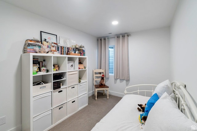 bedroom featuring recessed lighting, carpet, and baseboards