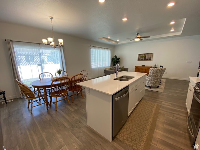 1255 S Raintree Ln, Santaquin, UT 84655 - kitchen with stainless steel dishwasher, light countertops, white cabinetry, recessed lighting, and dark wood-type flooring