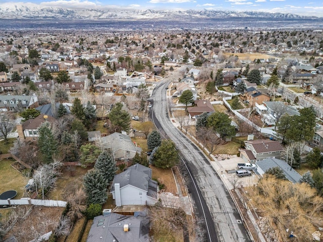 birds eye view of property featuring a mountain view and a residential view