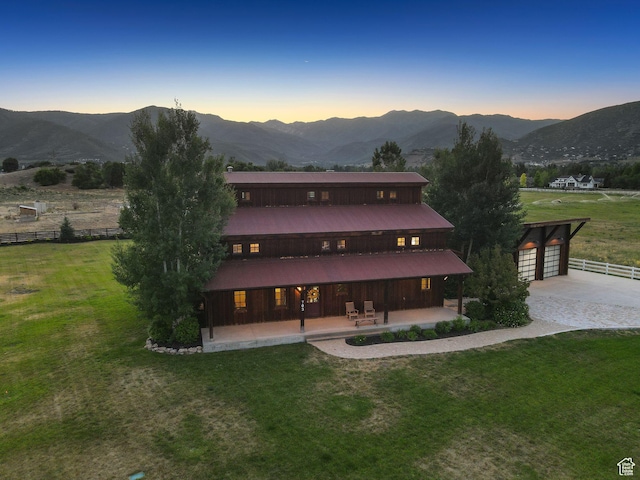 703 River Rd, Midway, UT 84049 - rear view of house with a mountain view and a patio area