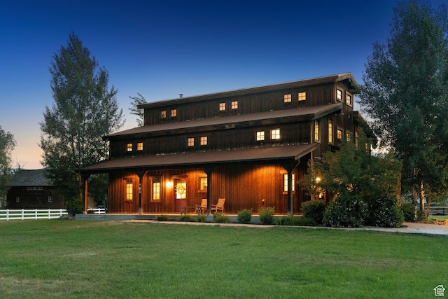 703 River Rd, Midway, UT 84049 - back of house at dusk with covered porch
