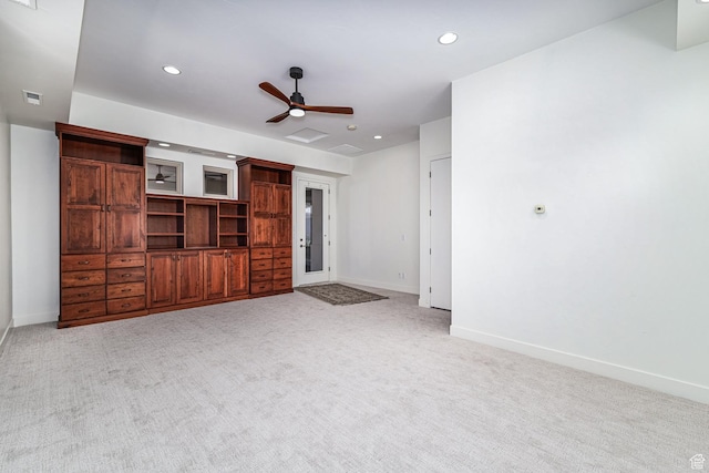 unfurnished living room with recessed lighting, light colored carpet, ceiling fan, and baseboards