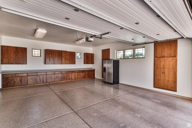 38 S 1840 W, St George, UT 84770 - garage featuring baseboards and a garage door opener