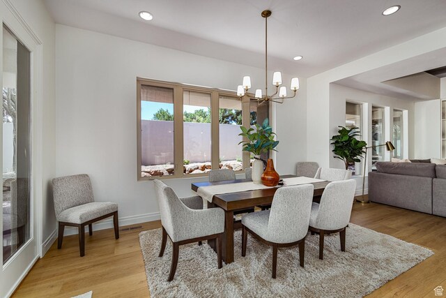 38 S 1840 W, St George, UT 84770 - dining space featuring recessed lighting, light wood-style flooring, baseboards, and an inviting chandelier