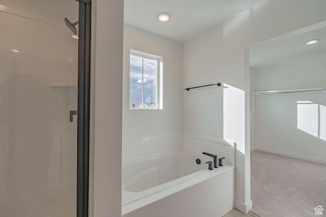1686 N 800 W, Salem, UT 84653 - bathroom with a bath, a shower stall, baseboards, and recessed lighting