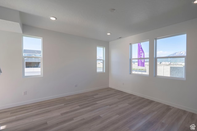 1686 N 800 W, Salem, UT 84653 - unfurnished room with light wood finished floors, baseboards, and recessed lighting