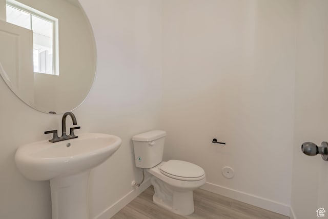 1686 N 800 W, Salem, UT 84653 - half bath with baseboards, wood finished floors, and toilet