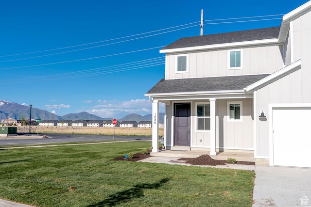 1686 N 800 W, Salem, UT 84653 - view of front of house with roof with shingles, a front lawn, a mountain view, and a porch